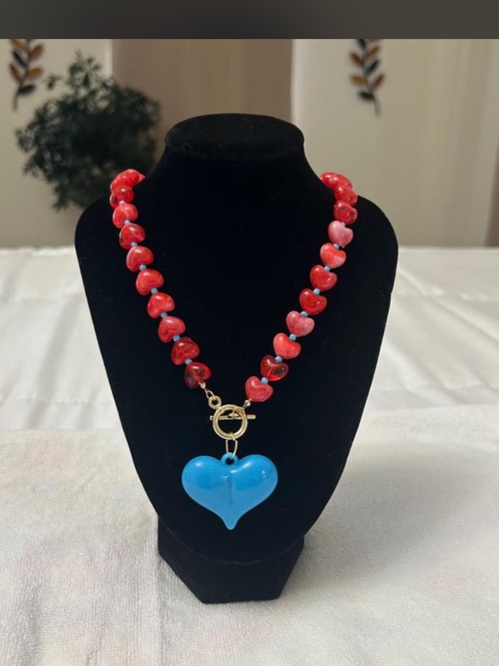 Red Heart Bead Necklace with Blue Heart Pendant